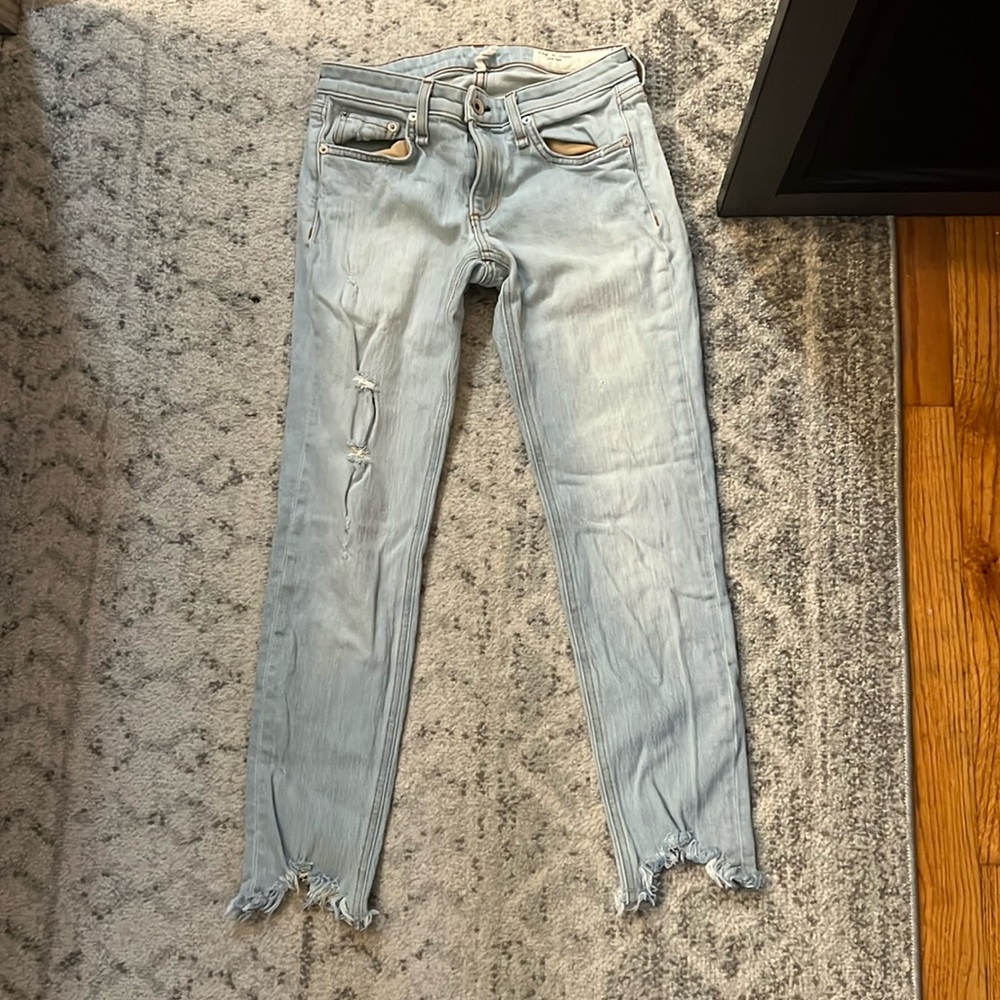 rag and bone light blue jean pants with intentional rips great condition size 23